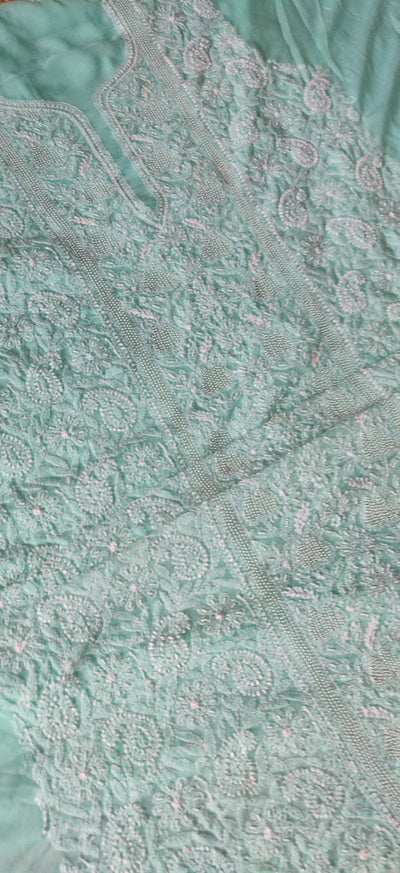 Mint green pure mul chikankari suit