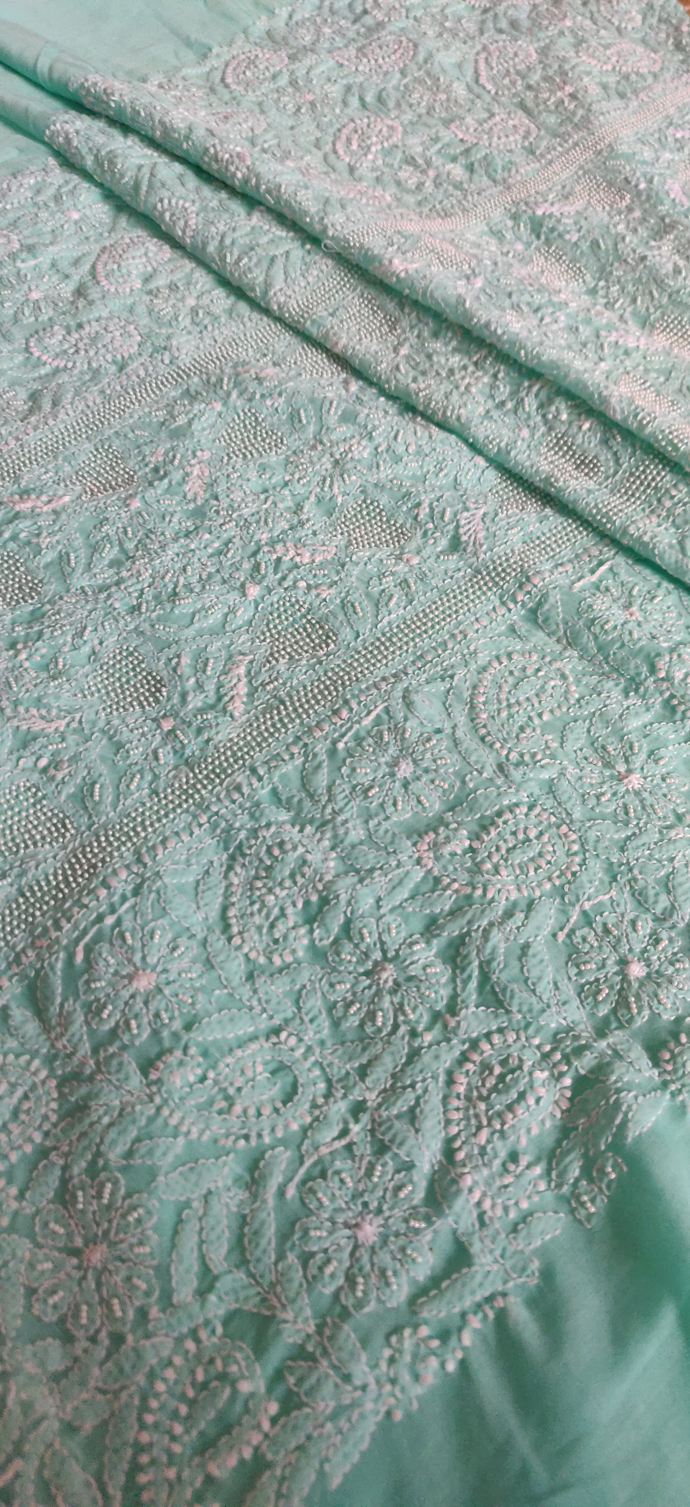 Mint green pure mul chikankari suit